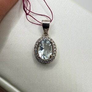 NWOT .62ct or 5x7mm oval cut AQUAMARINE pendant w/ halo of cz diamonds in s925!